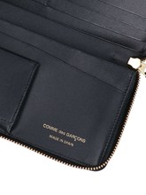Comme des garcons wallet Polka dot zip wallet available on